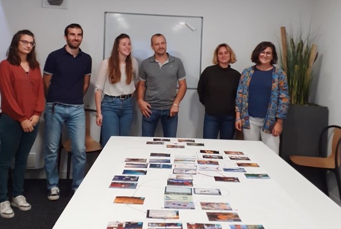 RSE : La fresque du climat finalisée et en arrière plan le groupe de travail pour une photo de groupe